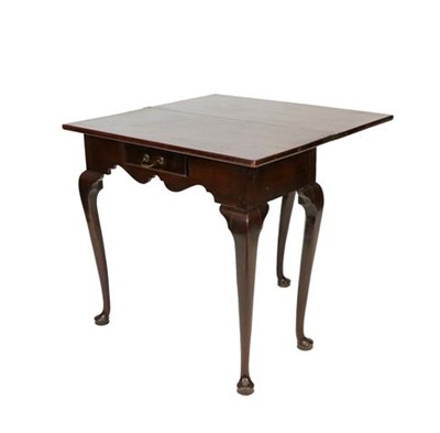 Lot 401 - A George III Mahogany Foldover Tea Table, 3rd quarter 18th century, with  rectangular hinged...