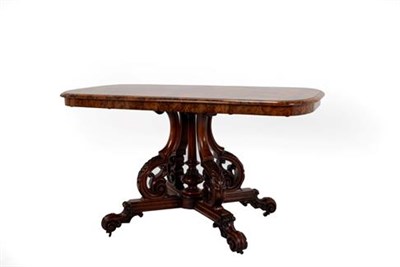 Lot 411 - A Victorian Burr Walnut and Carved Centre Table, circa 1870, of rounded rectangular form with...