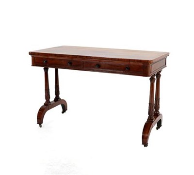 Lot 412 - A Victorian Rosewood Writing Table, 3rd quarter 19th century, the moulded top above two real...
