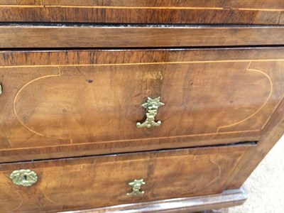 Lot 417 - A Late 17th Century Walnut and Tracery Strung Chest of Drawers, the moulded top above two short and