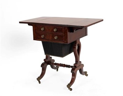 Lot 422 - A Regency Mahogany Dropleaf Work Table, early 19th century, with reeded edge and two real and...