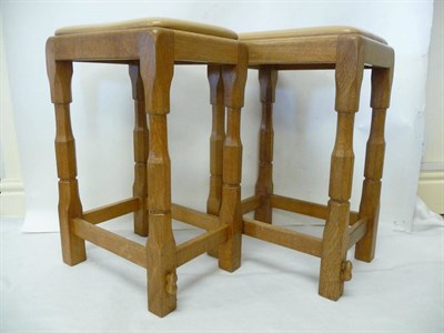 Lot 1844 - A Pair of Colin "Beaverman" Almack Oak Breakfast Bar Stools, with leather seats, on four turned...