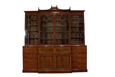 Lot 440 - A George III Mahogany, Tulipwood Banded Four-Door Breakfront Library Bookcase, early 19th...