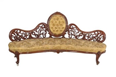 Lot 443 - A Victorian Carved Walnut Eight Piece Salon Suite, circa 1870, recovered in floral gold silk,...