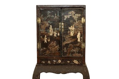 Lot 479 - A Chinese Kangxi Lac Burgaute Two-Door Cabinet, inlaid in mother-of-pearl with figures in...