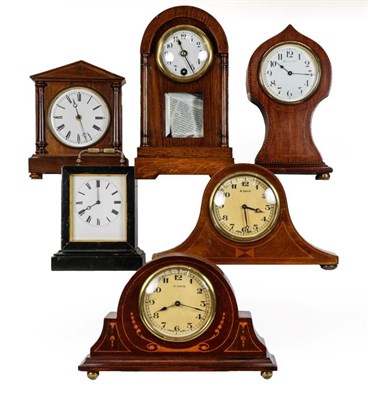 Lot 38 - An inlaid timepiece retailed by Harrods Ltd, four other mantel mahogany timepieces, and an ebonised