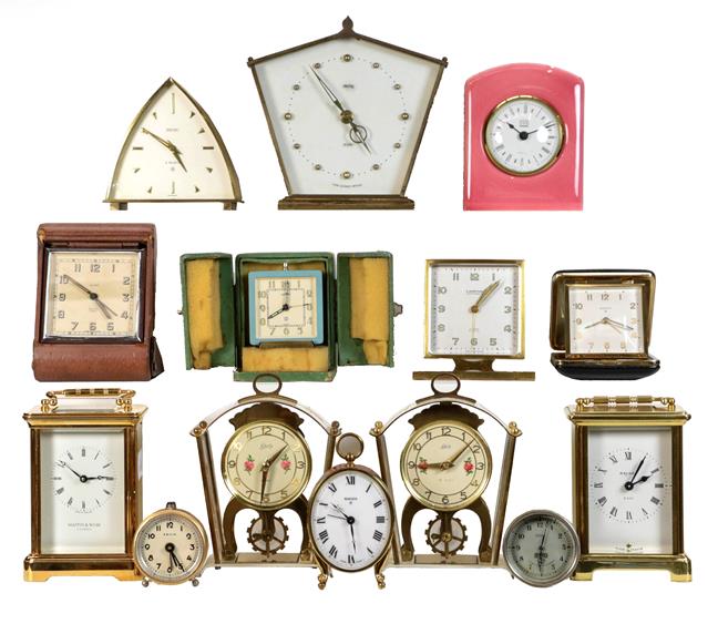 Lot 39 - A selection of timepieces, including: a Le Coultre travel alarm timepiece with outer shagreen...