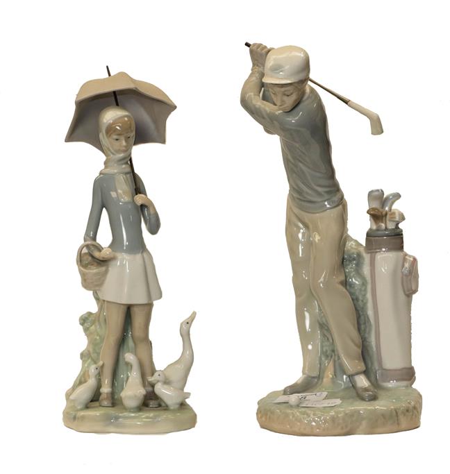 Lot 48 - A Lladro figure of a golfer, model number D-14D, and a girl & geese (2)
