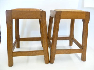 Lot 1850 - A Pair of Sid Pollard Oak Stools, with studded leather seats, on four octagonal tapered legs joined