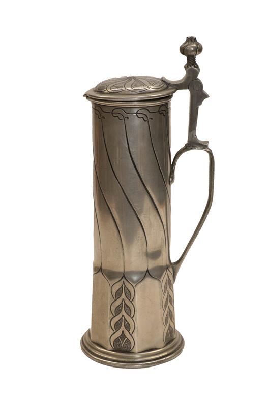 Lot 56 - A pewter stein, late 19th century, of elongated form
