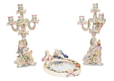 Lot 65 - A quantity of Sitzendorf porcelain including a pair of figural four branch candelabra, a mirror...