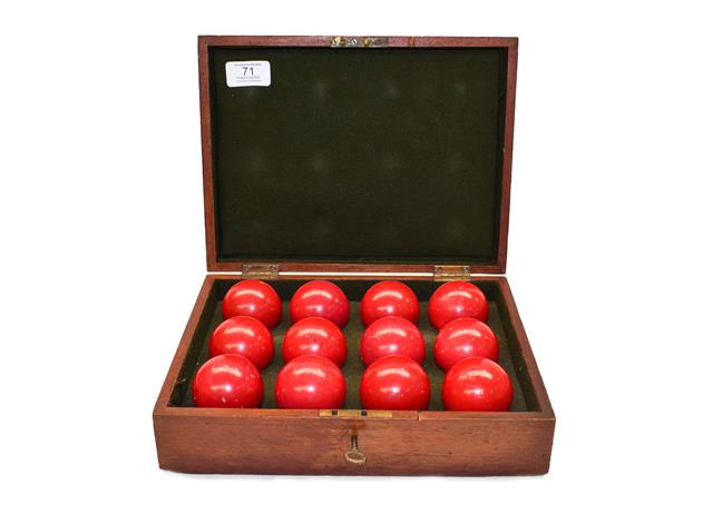Lot 71 - A Burrows and Watts cased part set of Victorian stained ivory billiard balls, comprising twelve red