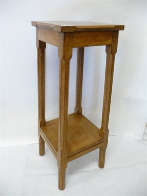 Lot 1852 - A Sid Pollard Oak Plant Stand, the shaped top on four octagonal legs with an undertier,...