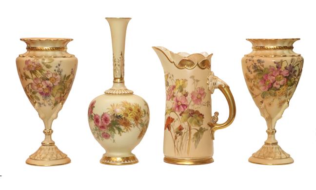 Lot 90 - A pair of Royal Worcester blush ware vases, painted with flowers and having claw form...