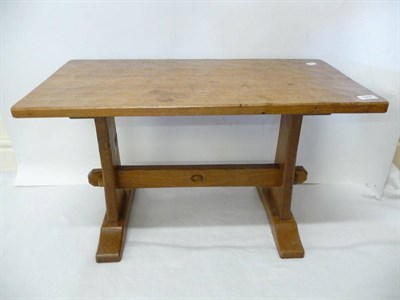 Lot 1855 - An Alan Grainger Acorn Industries Oak Rectangular Coffee Table, on shaped supports joined by a...