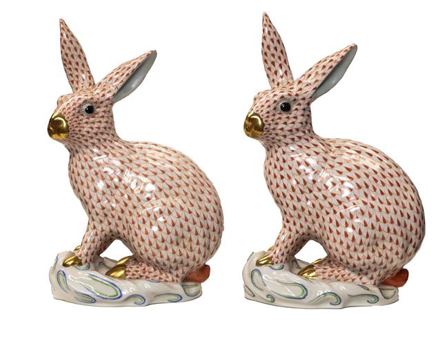 Lot 105 - A pair of large Herend porcelain models of hares, each 30cm high