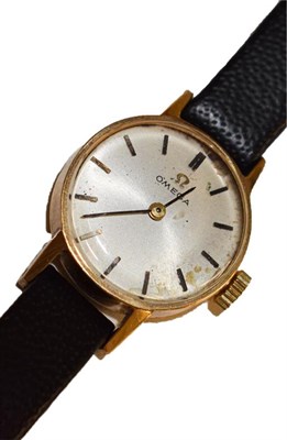 Lot 119 - A lady's 9 carat gold Omega wristwatch, another lady's 9 carat gold wristwatch with attached...