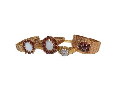 Lot 134 - Two 9 carat gold opal and garnet cluster rings, finger size G and N1/2 (a.f.), a 9 carat gold...