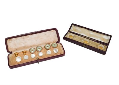 Lot 139 - Six mother-of-pearl buttons, four mother-of-pearl and green enamel buttons, two 9 carat gold...
