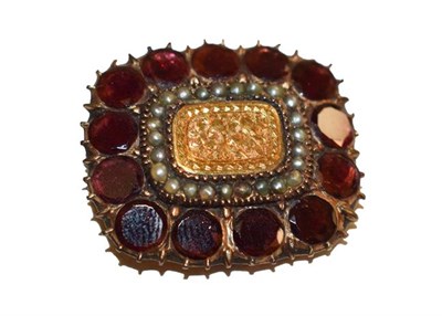 Lot 142 - A 19th century garnet and split pearl brooch, measures 2.5cm by 2.2cm