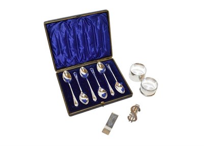 Lot 149 - A cased set of six silver tea spoons, a silver clip stamped Tiffany & Co 925, another silver...