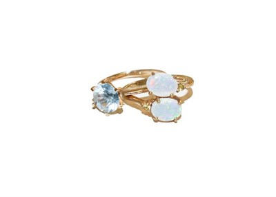 Lot 163 - A 9 carat gold opal twist ring, finger size N, and a 9 carat gold blue zircon ring, finger size...
