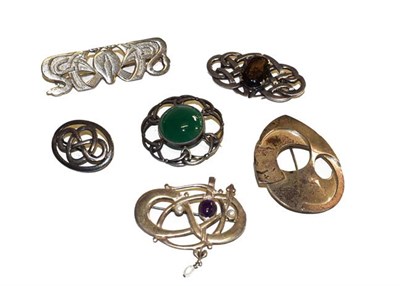 Lot 178 - Six Arts & Crafts style brooches, of varying designs and sizes, one set with quartz and one...