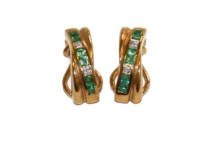 Lot 179 - A pair of emerald and diamond earrings, stamped '375', with clip fittings, length 1.8cm