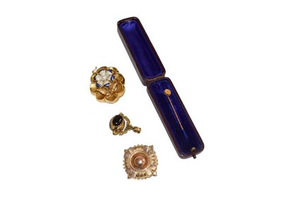 Lot 188 - Two Victorian brooches (one enamelled), an agate and tiger's-eye swivel fob, and a diamond...