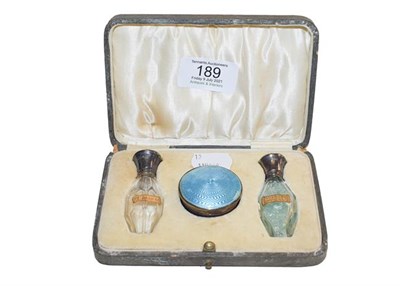 Lot 189 - A George V cased silver enamelled scent set by Albert Carter, Birmingham, 1924, comprising a...