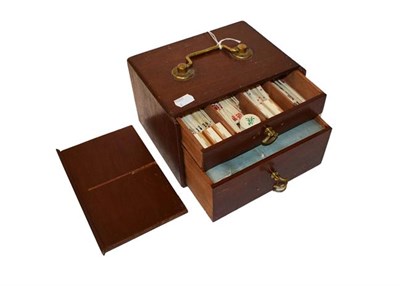Lot 217 - A bone and bamboo mahjong set, in original box