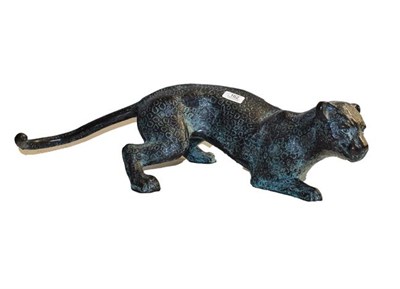 Lot 221 - A 20th century patinated metal model of a stalking leopard