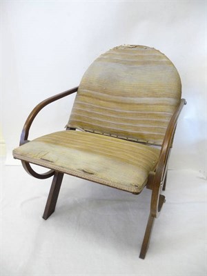 Lot 1869 - An Art Deco Oak and Plywood Desk Chair, upholstered seat and back, constructed with solid one piece