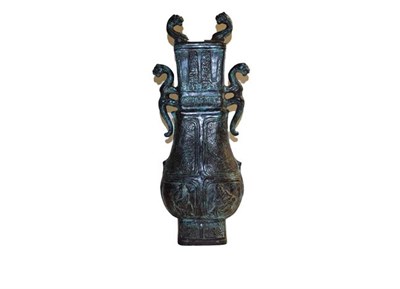 Lot 243 - An Eastern bronze twin-handled vase after the antique