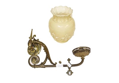 Lot 253 - A pair of Victorian brass wall lights with moulded opaque yellow glass shades (a.f.) (2)