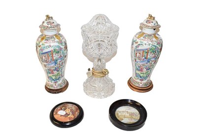 Lot 280 - A pair of 19th century Cantonese vases and covers raised on hardwood plinths (a.f.), 35cm, a...