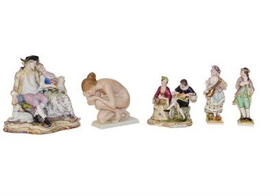 Lot 286 - A tray of Continental porcelain figures including a Meissen style figure of a seated shepherd...