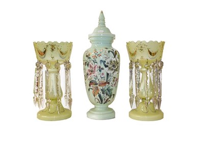 Lot 287 - A pair of early 20th century opaque yellow glass table lustres, a similar large covered vase, and a