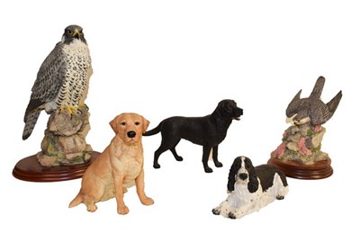 Lot 292 - Border Fine Arts: a peregrine falcon, a Labrador, a spaniel, a peregrine falcon, a yellow...