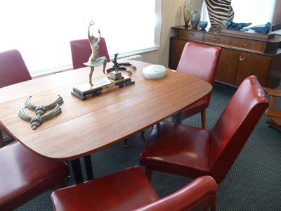 Lot 1879 - A G-Plan Dining Room Suite, comprising mahogany dropleaf table on ebonised tapering legs, 132cm...