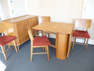 Lot 1883 - A White & Newton of Portsmouth Oak Dining Room Suite, comprising a drop-leaf table, four chairs and