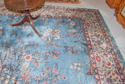 Lot 1002 - Isparta carpet, the mid indigo field with a one way tree of life design, enclosed by floral...