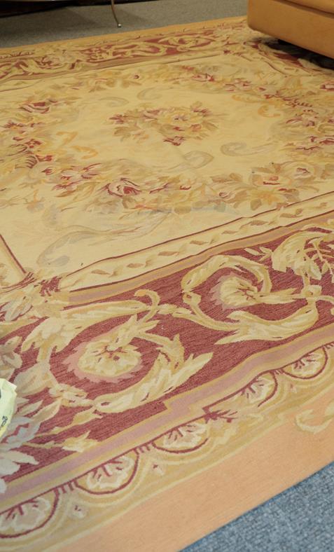 Lot 1009 - Chinese 'Aubusson' carpet, the cream field of naturalistic floral design enclosed by borders of...