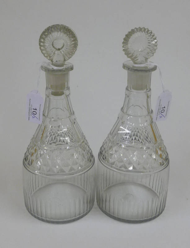 Lot 10 - A Pair of Cut Glass Spirit Decanters and Two Stoppers, circa 1800, with disc knops, panelled...