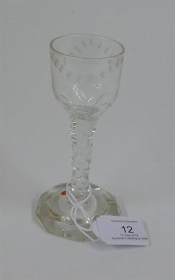 Lot 12 - A Wine Glass, circa 1775, the ogee bowl cut with a meandering band of stars on an hexagonal faceted
