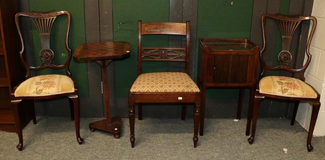 Lot 1089 - A mahogany tambour-front bedside cabinet, a 19th century games table, three chairs and a pine delft
