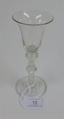 Lot 13 - An Opaque Twist Wine Glass, circa 1760, the bell shaped bowl on a double knopped stem and...