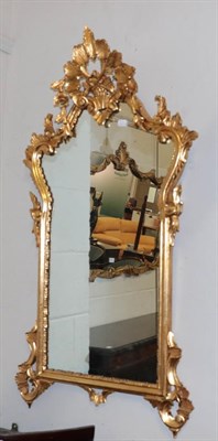 Lot 1116 - A 20th century Neo-Classical style hall mirror adorned with an urn shaped pediment, 56.5cm by...