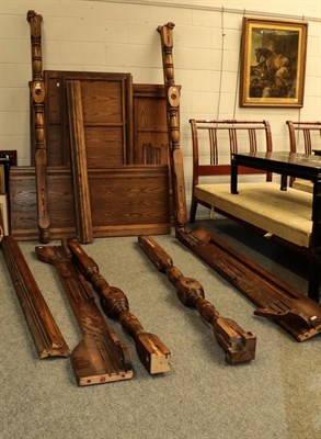 Lot 1121 - A modern oak panelled four poster bed in the 18th century style, (a.f.) approximate width 166cm