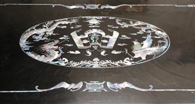 Lot 1123 - A 20th century black lacquer and mother-of-pearl inlay decorated low opium/coffee table...